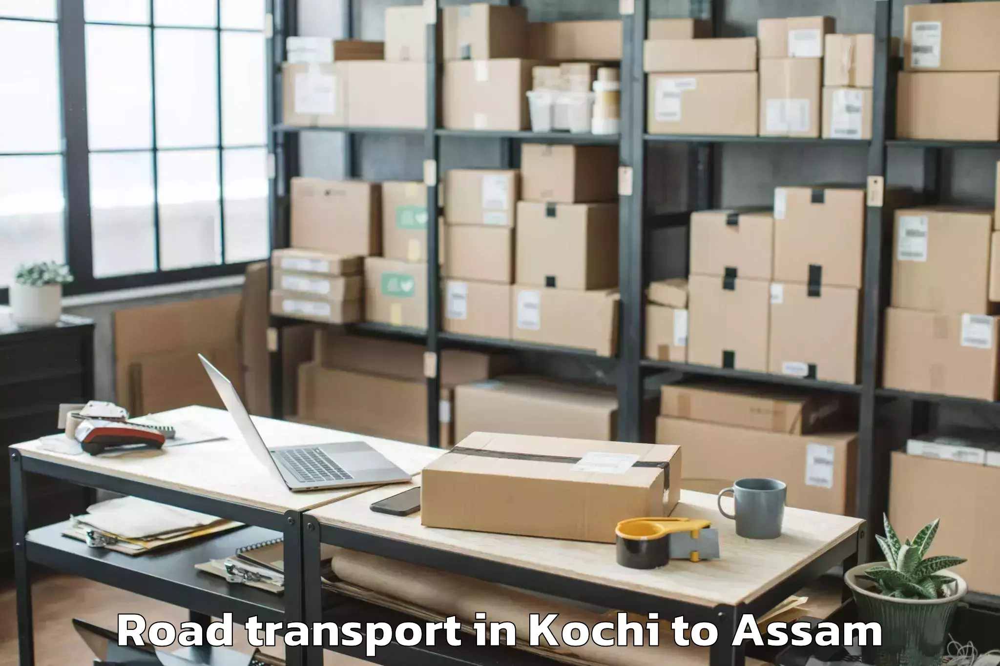 Book Kochi to Dibrugarh Road Transport Online